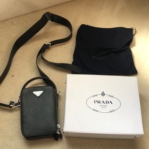 Prada gender neutral cross body or clutch bag